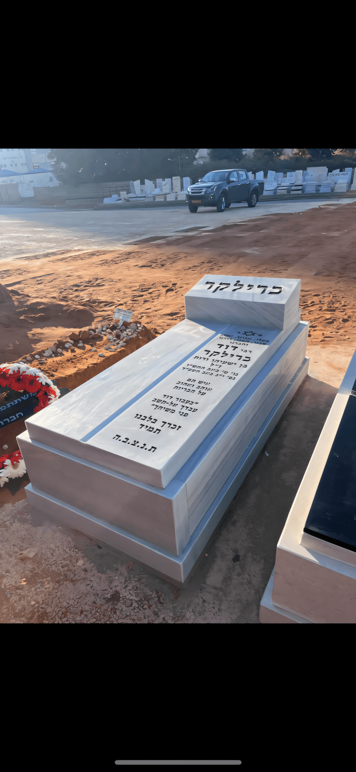 חריטת אותיות על מצבה